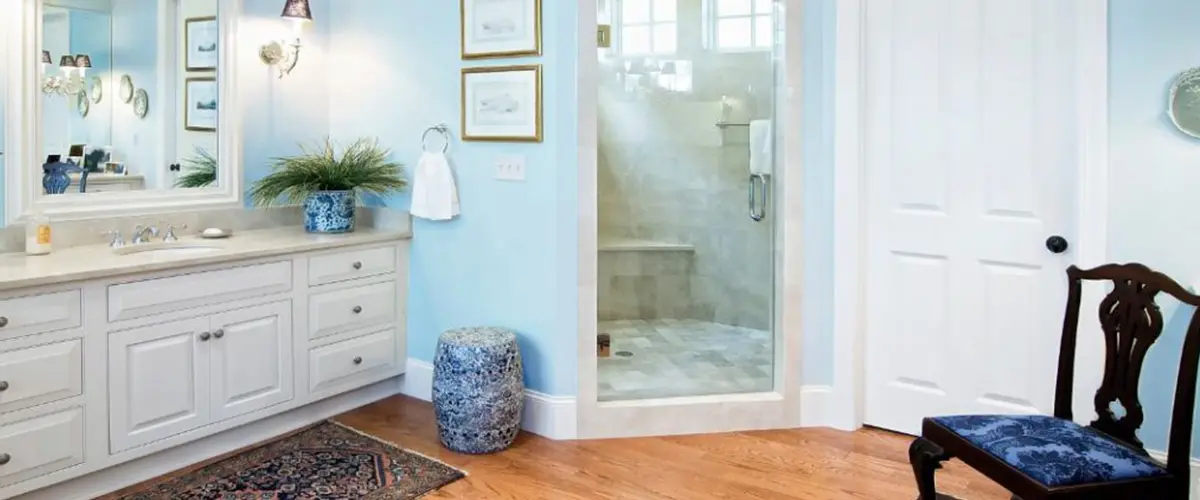luxury chair and rug in bathroom remodel