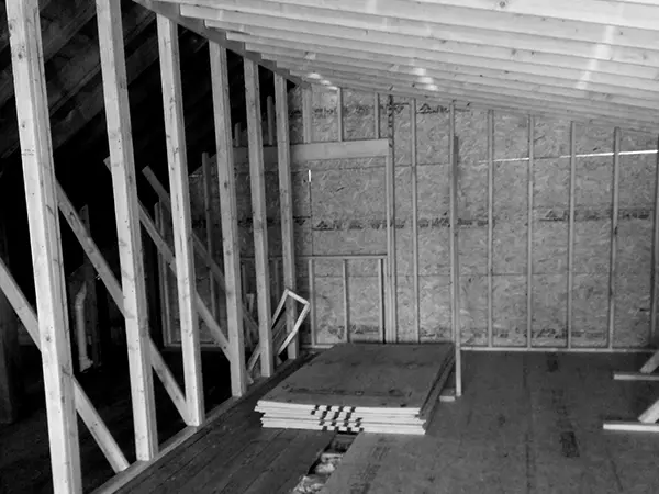 A home remodeling project where the wood frame and the drywall is visible