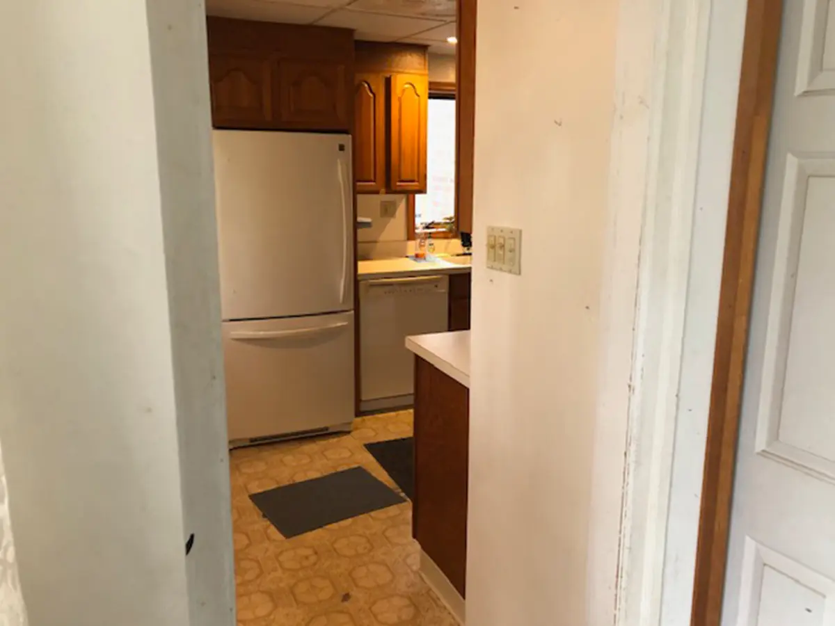 An old kitchen with dated floors