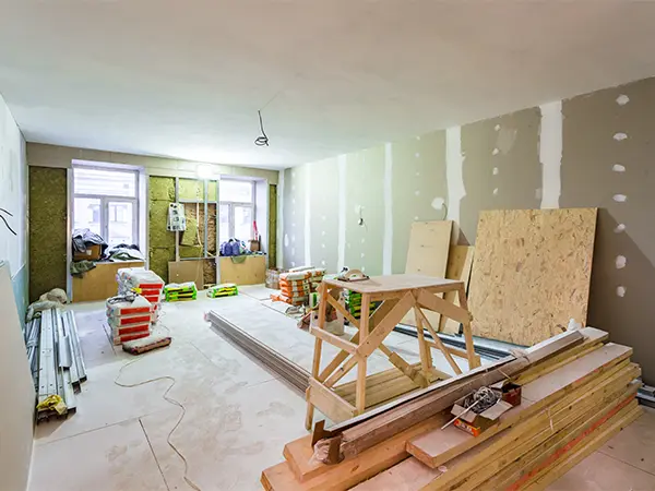 A home remodel for a room filled with tools, equipment, and materials